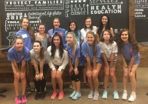 NCL Frisco members volunteering at the Shoes For Orphan Souls event.