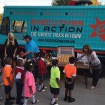 The Executives in Action Kindness truck provides Random Snacks Of Kindness to students at St. Phillips School and Community Center in Dallas.