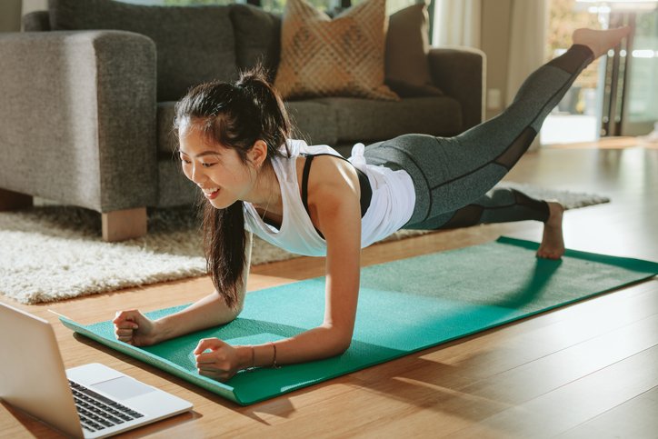 girl exercising at home